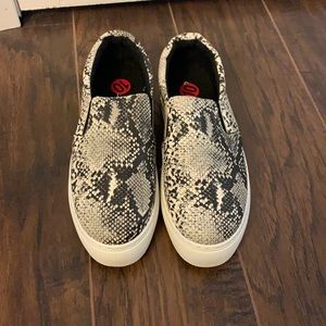 Brand new, never worn snake skin slip ons